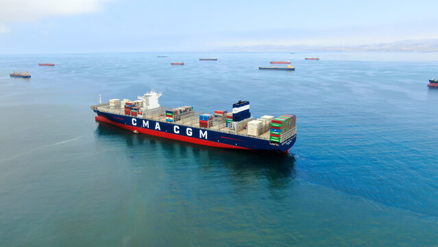 Callao, Lima, Peru -12.04.2022 Aerial view of ultra large container ship CMA CGM J.Adams in discharged condition at anchor near port Callao, Lima, Peru awaiting for enter to port