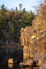 autumn in river gorge with cliffs