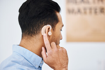 Hearing aid, deaf and man with ear disability with medical support device as wellness innovation or...