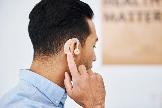 Hearing Aid, Deaf And Man With Ear Disability With Medical Support Device As Wellness Innovation Or Audiology Implant. Patient, Auditory And Male Person With An Amplifier For Help Listening