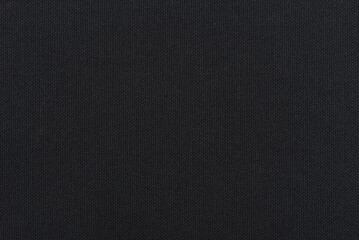 Fototapeta na wymiar dark gray cotton fabric sample for background
