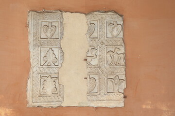 Ancient Sculpted Tablet on the Portico Wall of the Santa Cecilia Basilica in Rome, Italy