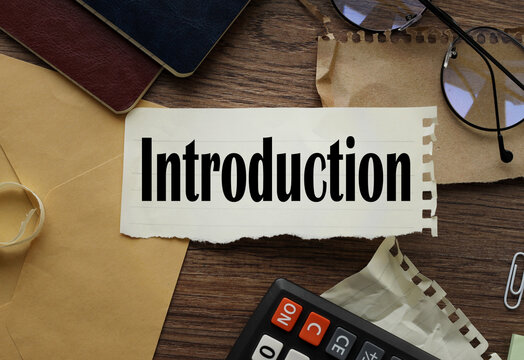 Introduction Word for business concept. torn paper with text on stationery