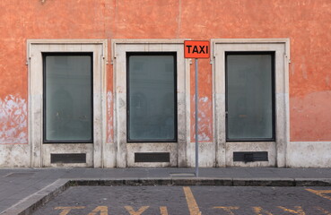 Rome Street View with Building Facade Detail and Taxi Stand, Italy