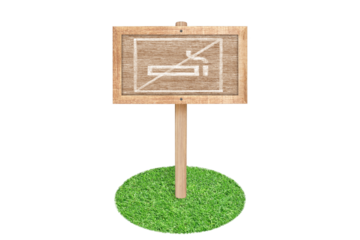 wooden sign No smoking , isolated on grass isolate on white