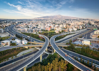 Aerial panoramic view of multilevel junction highway road interchange section as seen in National Road motorway, Athens, Greece