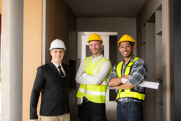 Meeting engineers or architects for projects, working with partners and engineering tools to create workplace models and blueprints. construction concept