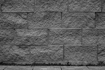 Abstract background of a gray brick wall.