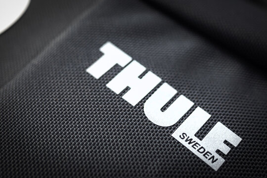 Close-up on the THULE logo on a branded products. Almaty, Kazakhstan - April 16, 2023