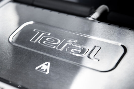 Close-up of the Tefal logo on on steel appliances. Almaty, Kazakhstan - April 15, 2023