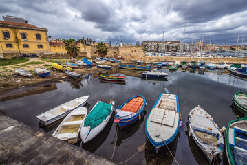 Fototapeta na wymiar Port with Fishing boats in Syracuse town, Sicily Island, Italy