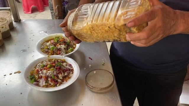 Indian Pakistani Street Food Samosa Chaat Chana Chaat with Samosa and chutney yoghurt salad onion healthy sauce