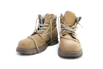 A pair of work boots isolated on a white background.