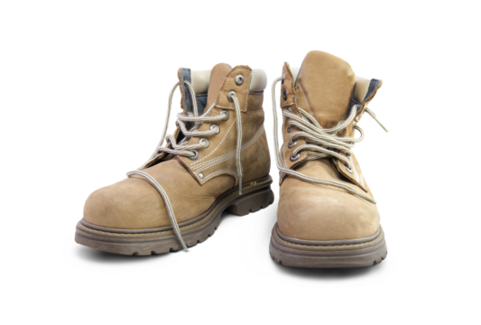 A pair of work boots isolated on a white background.
