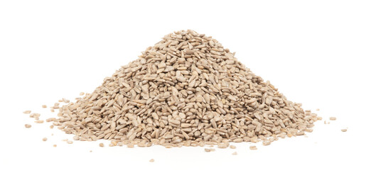 Heap of natural shelled sunflower seeds over white background