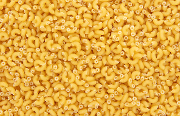 Uncooked elbow macaroni, isolated full frame