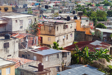 Poor residential district of Santo Domingo on a daytime, aerial view - obrazy, fototapety, plakaty