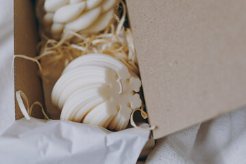 Wax candles in cardboard boxes packed for dispatch