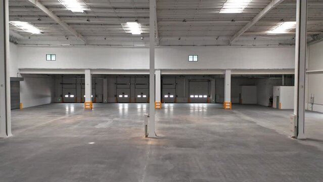 Aerial Shot of Interior of Newly Built Empty Distribution Warehouse