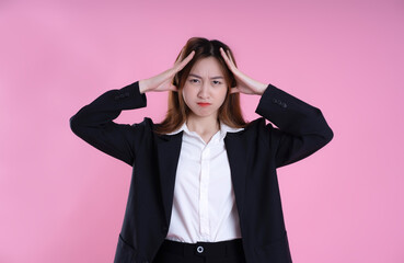 image of businesswoman posing on pink background