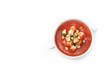 Traditional Spanish gazpacho soup in bowl isolated on white background. Top view. Copy space