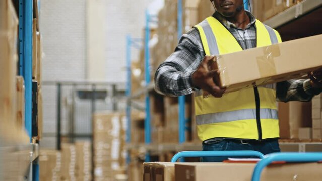 Voice directed warehousing: Warehouse worker uses a headset to pick orders for shipping