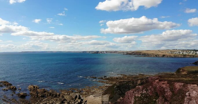 Aerial View From Thurlestone Coastline Looking Out to Blue English Channel. Slow Dolly Shot