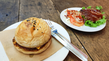 Pork burger with cheese and salad