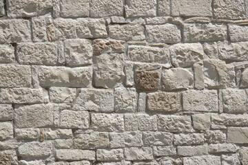 ancient white stone wall of a house