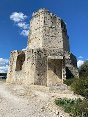 Nîmes, France - 04 19 2023: The Gardens of La Fontaine. View of the Magne tower.