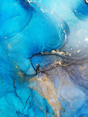 Abstract alcohol ink art with golden details in blue and purple