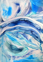 Abstract alcohol ink art background in blue and purple waves
