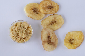 Gluten-free dried banana flour on white background