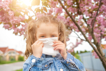 The child has a cold and is prone to allergies.