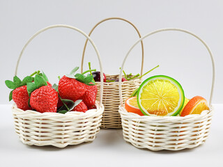 Fruits in the basket isolated on white