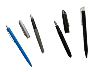 minimalist ballpoint and fountain pen isolated or on white background / open with separate cap and closed / isolated on a transparent background / design element 