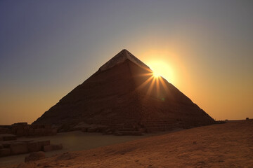 Fototapeta na wymiar Pyramid at sunset