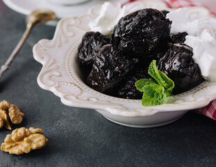 Cup of tea with prunes top view