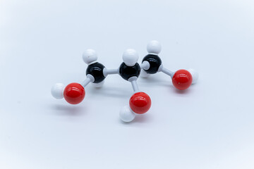 Glycerol molecule made by molecular model on white background. Vegetable Glycerin chemical formula with colored atoms and bonds