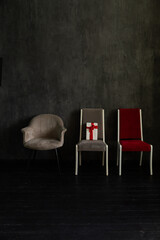 Armchair chair grey red on black background in room interior furniture