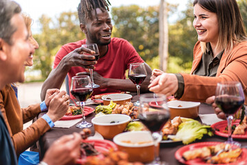 Outdoor Feast with Diverse Friends - Friends enjoy a table with skewers and sides, plus-size girl jokes and points at a dish in a green backyard.