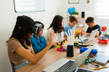 Group of teens having fun with virtual reality in junior high school