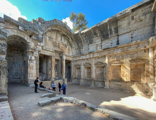 Nîmes, France - 04 19 2023: The Gardens of La Fontaine. View of the Temple of Diana.