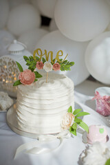 First birthday cake with white cream