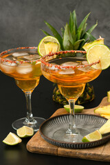 Spicy Margarita cocktail with pineapple,  jalapeno and lime