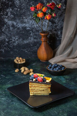 front view yummy chocolate cake with fruits on dark background dough biscuit dessert cake pie sweet tea sugar colors