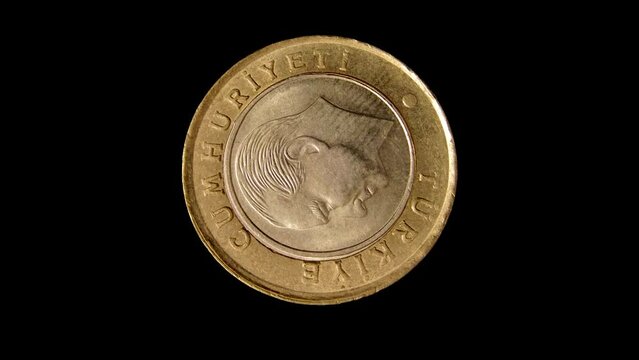 Obverse of Turkey coin 1 lira isolated in black background. 4k video