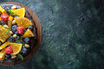 top view yummy chocolate cake with fresh fruits on dark background dessert pie sugar cake sweet biscuit dough free place