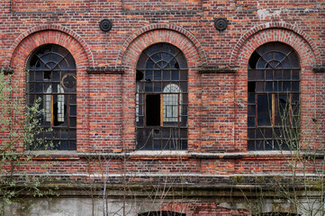 Abandoned neglected red brick buildings of the great textile industry in Lodz
