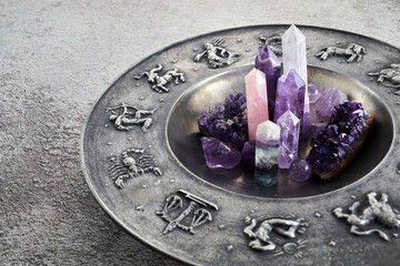 Crystals for healing, fortune telling and astrologhy circle on grey background. Esoteric and life...